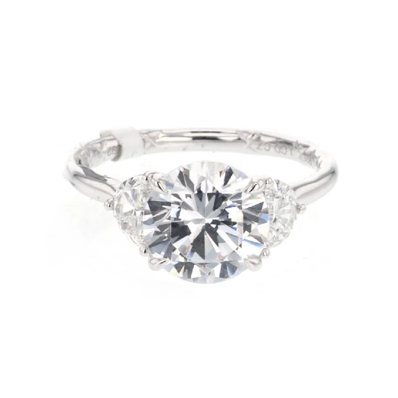 0.66 ctw Diamond Three-Stone Engagement Ring